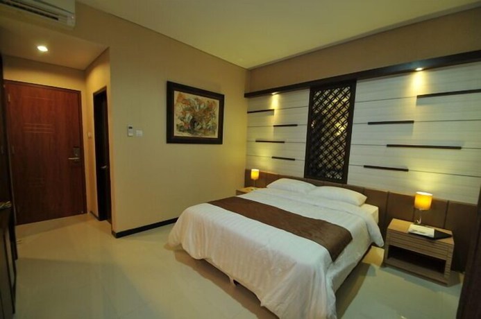 Imagen de la habitación del Hotel D'madinah Residence Syariah Solo. Foto 10