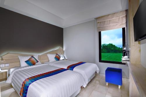 Imagen de la habitación del Hotel D'max & Convention. Foto 7