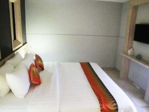 Imagen de la habitación del Hotel D'max & Convention. Foto 9