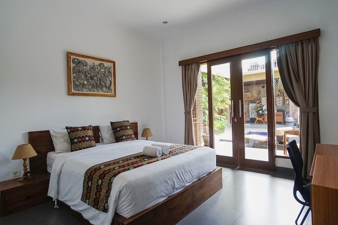 Imagen de la habitación del Hotel D\'meten Guest House. Foto 6