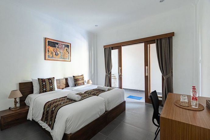 Imagen de la habitación del Hotel D\'meten Guest House. Foto 10