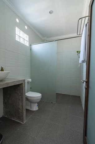 Imagen de la habitación del Hotel D\'meten Guest House. Foto 11