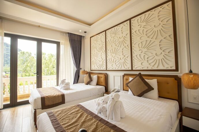 Imagen de la habitación del Hotel Doan Gia Resort Phong Nha. Foto 12