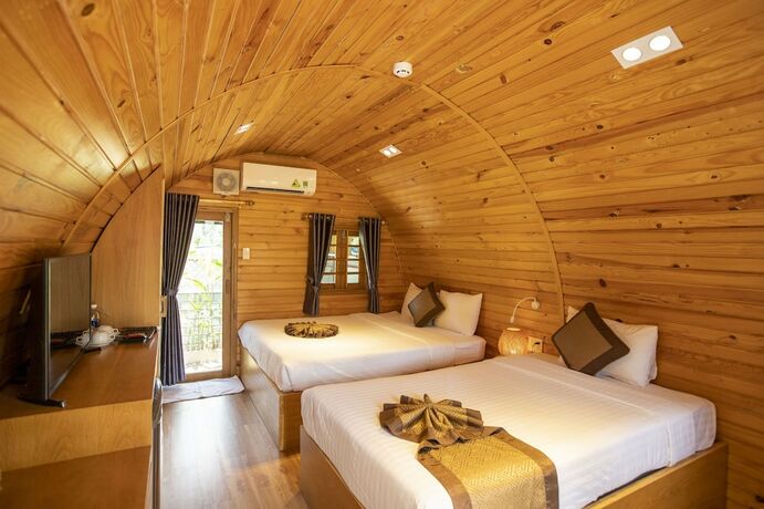 Imagen de la habitación del Hotel Doan Gia Resort Phong Nha. Foto 18