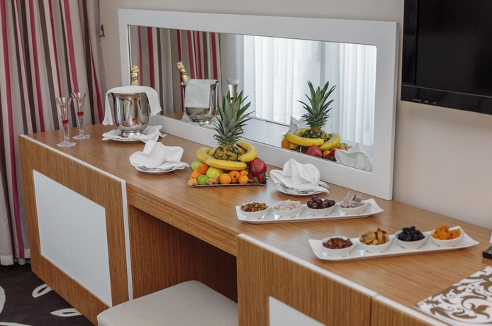 Imagen de la habitación del Hotel Dobedan World Palace. Foto 7