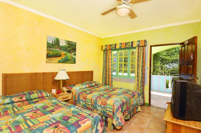 Imagen de la habitación del Hotel Doctors Cave Beach. Foto 6