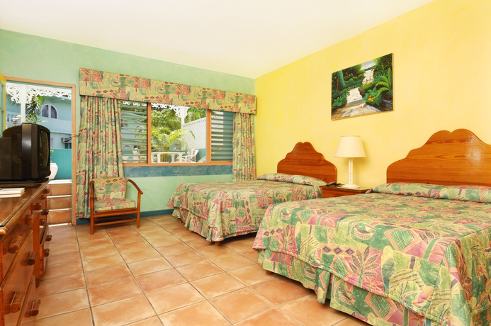 Imagen de la habitación del Hotel Doctors Cave Beach. Foto 10