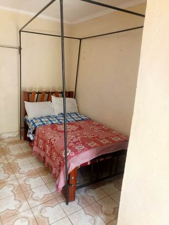 Imagen de la habitación del Hotel Dodoma Guest House. Foto 17