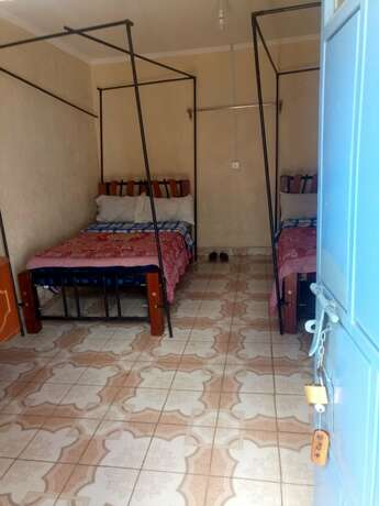 Imagen de la habitación del Hotel Dodoma Guest House. Foto 18