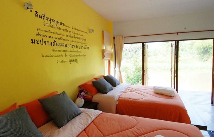 Imagen de la habitación del Hotel Doembangvilla. Foto 14