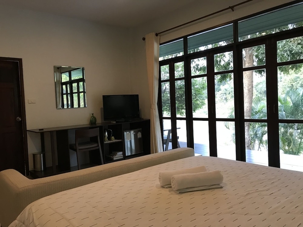 Imagen de la habitación del Hotel Doembangvilla. Foto 17