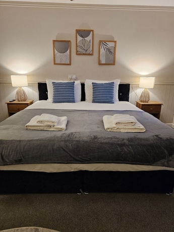 Imagen de la habitación del Hotel Dog and Partridge Inn. Foto 9