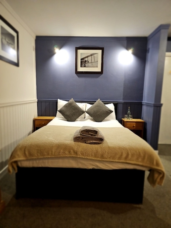 Imagen de la habitación del Hotel Dog and Partridge Inn. Foto 11