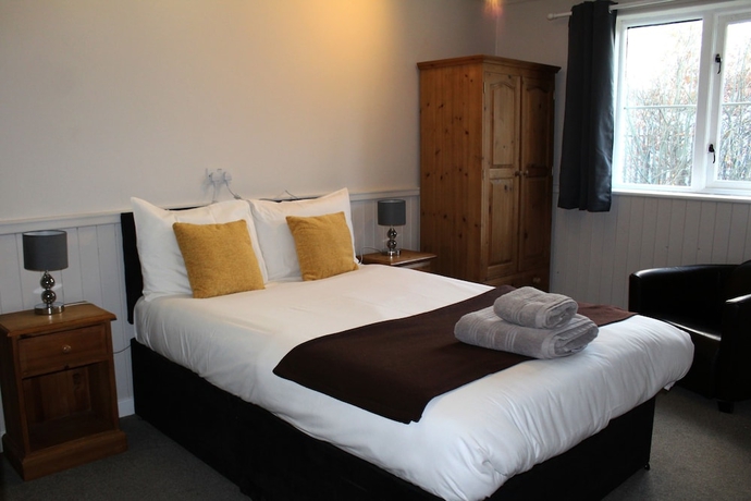 Imagen de la habitación del Hotel Dog and Partridge Inn. Foto 12