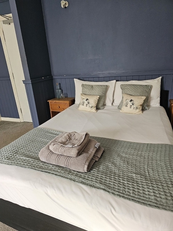 Imagen de la habitación del Hotel Dog and Partridge Inn. Foto 13