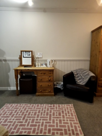 Imagen de la habitación del Hotel Dog and Partridge Inn. Foto 15
