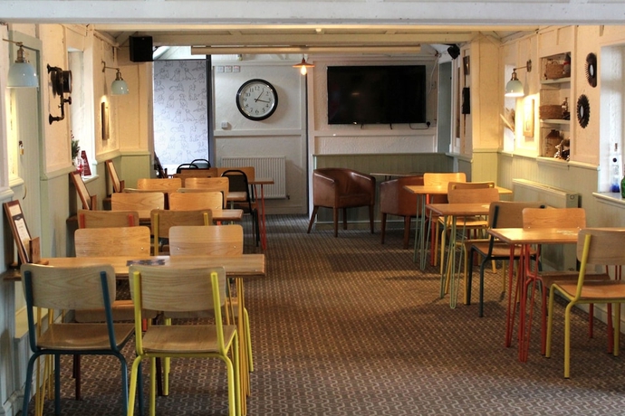 Imagen del bar/restaurante del Hotel Dog and Partridge Inn. Foto 5