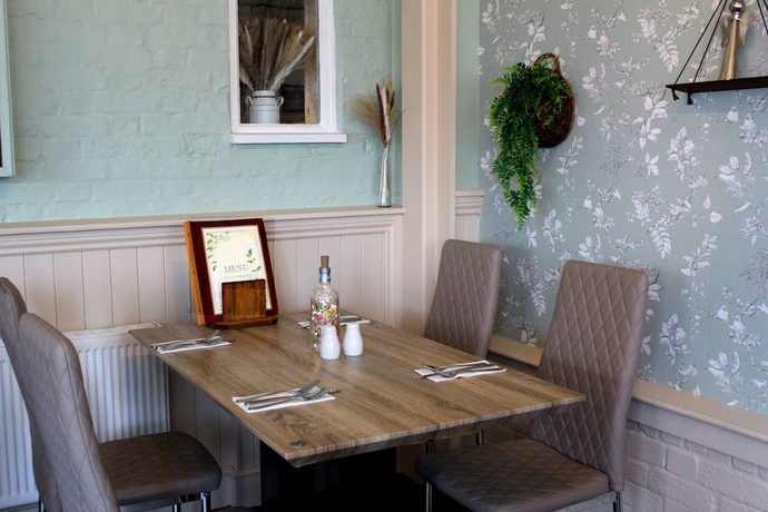 Imagen del bar/restaurante del Hotel Dog and Partridge Inn. Foto 6