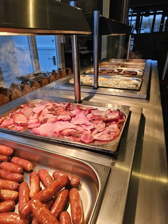 Imagen del bar/restaurante del Hotel Dog and Partridge Inn. Foto 8