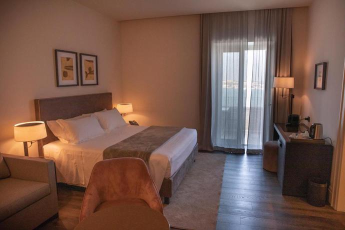 Imagen de la habitación del Hotel Dogana Resort. Foto 3