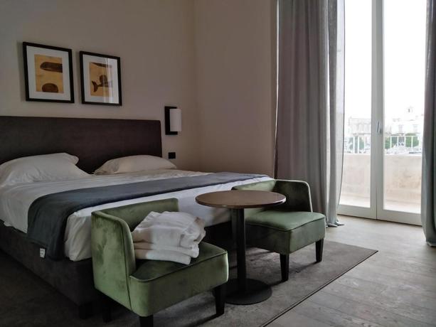 Imagen de la habitación del Hotel Dogana Resort. Foto 4