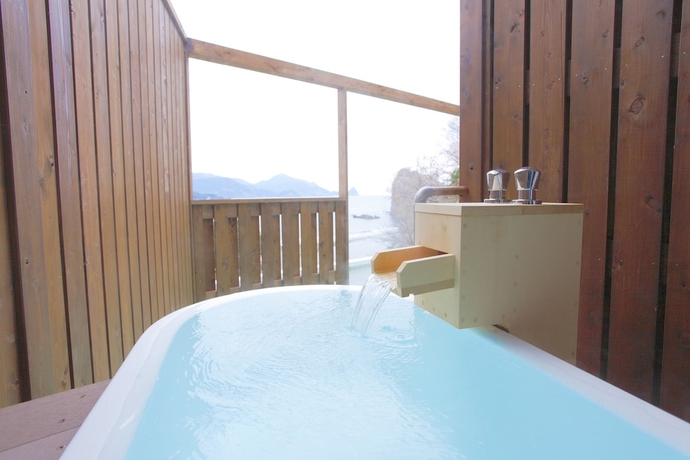 Imagen de la habitación del Hotel Dogashima Onsen. Foto 17