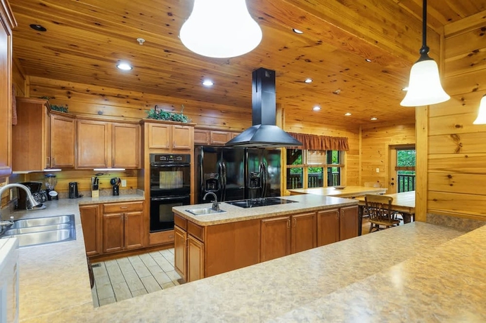Imagen de la habitación del Hotel Dogwood Grand Cabin Hot tub and Games. Foto 8
