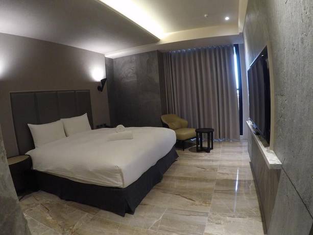 Imagen de la habitación del Hotel Doho confucius hotel. Foto 11