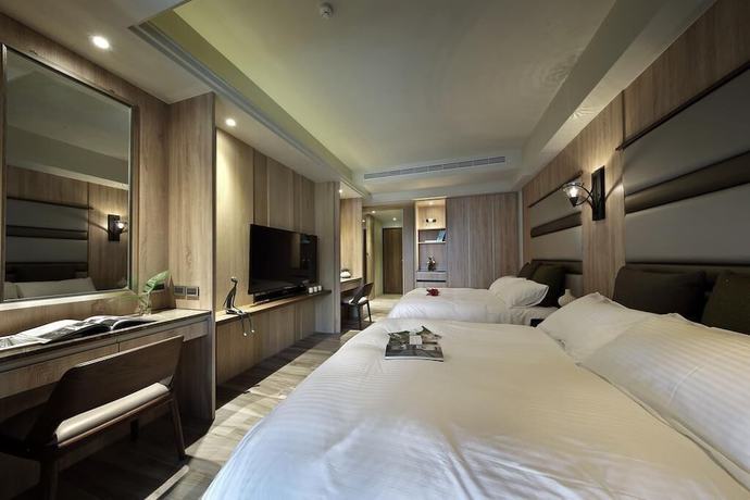 Imagen de la habitación del Hotel Doho confucius hotel. Foto 12