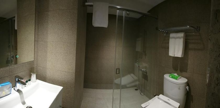 Imagen de la habitación del Hotel Doho confucius hotel. Foto 13