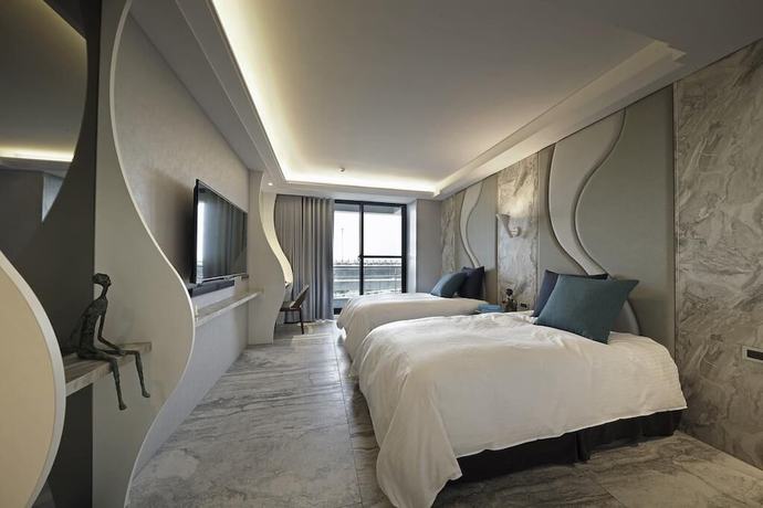 Imagen de la habitación del Hotel Doho confucius hotel. Foto 15