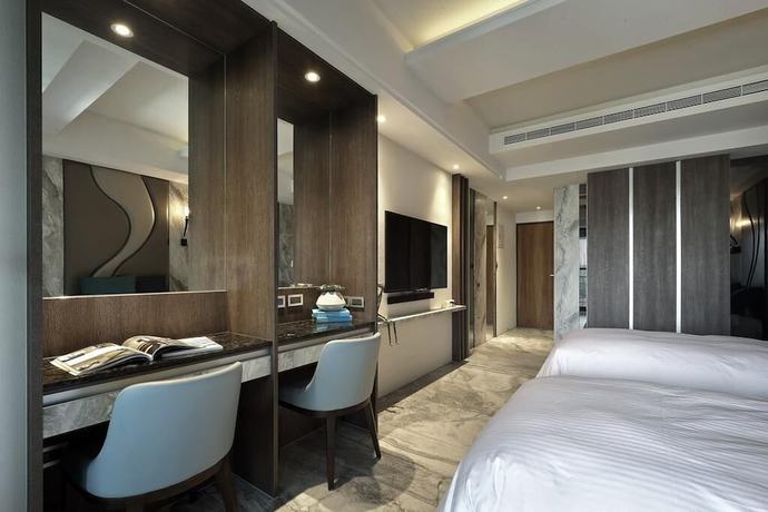 Imagen de la habitación del Hotel Doho confucius hotel. Foto 16
