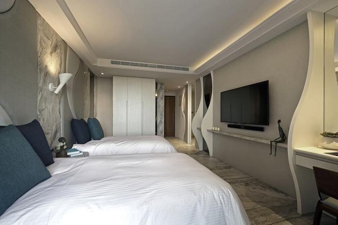 Imagen de la habitación del Hotel Doho confucius hotel. Foto 20