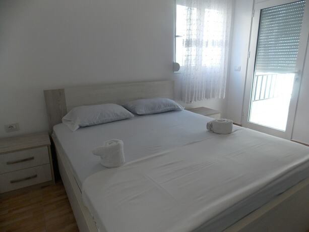 Imagen de la habitación del Hotel Doka Apartments. Foto 17