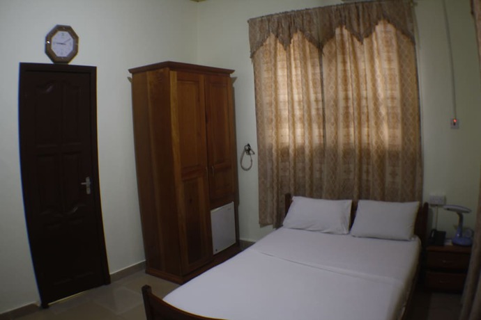 Imagen de la habitación del Hotel Dokua Royal. Foto 13