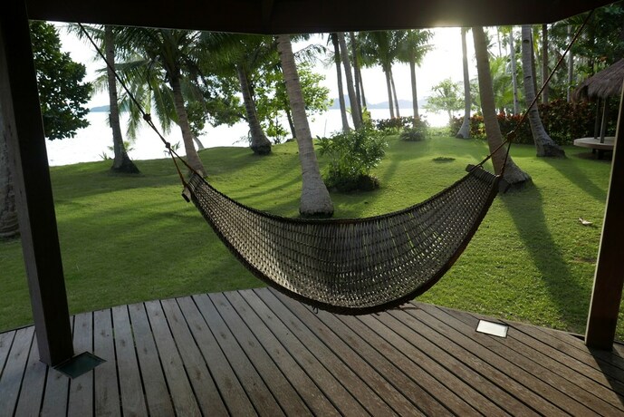 Imagen de la habitación del Hotel Dolarog Beach Resort. Foto 12