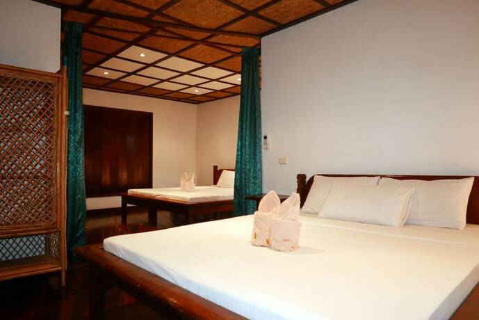 Imagen de la habitación del Hotel Dolarog Beach Resort. Foto 13