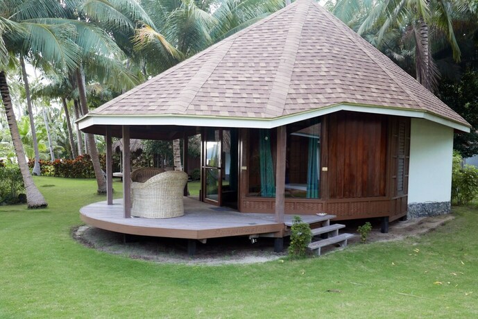 Imagen de la habitación del Hotel Dolarog Beach Resort. Foto 14