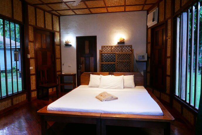 Imagen de la habitación del Hotel Dolarog Beach Resort. Foto 15