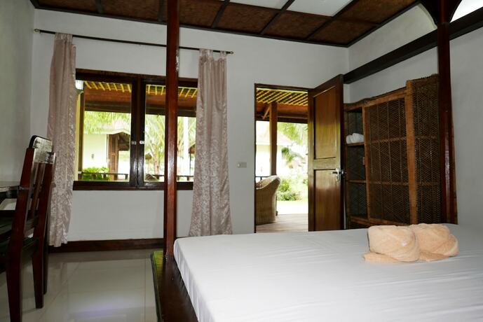 Imagen de la habitación del Hotel Dolarog Beach Resort. Foto 16