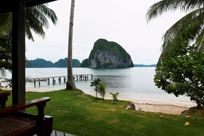 Imagen de la habitación del Hotel Dolarog Beach Resort. Foto 20