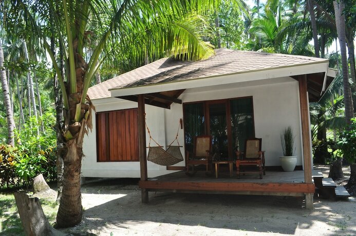 Imagen de la habitación del Hotel Dolarog Beach Resort. Foto 22