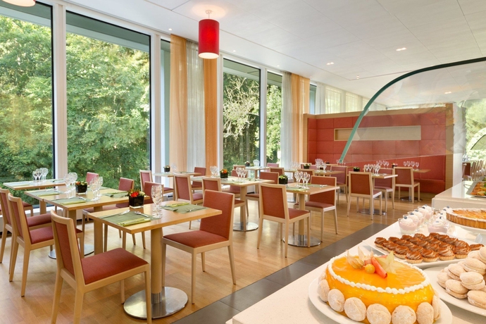 Imagen del bar/restaurante del Hotel Dolce By Wyndham La Hulpe Brussels. Foto 4