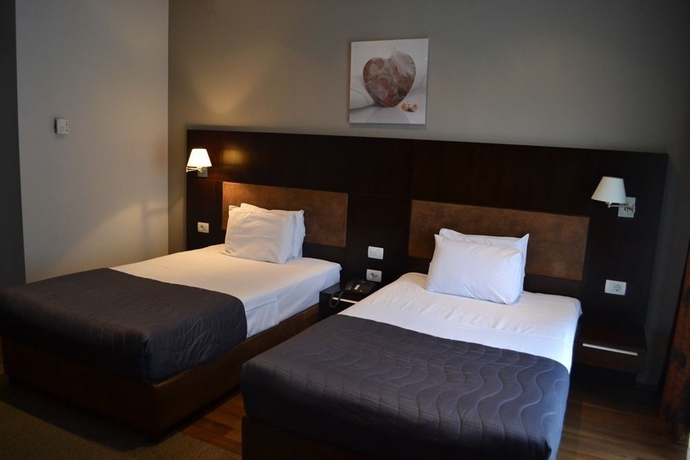 Imagen de la habitación del Hotel Dolce International. Foto 11