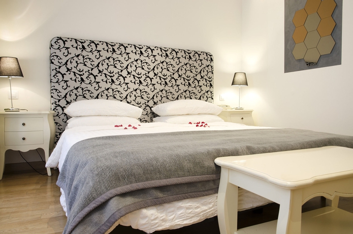 Imagen de la habitación del Hotel Dolce Vita Suites. Foto 9