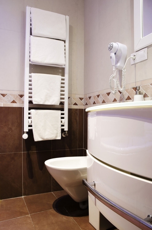 Imagen de la habitación del Hotel Dolce Vita Suites. Foto 10