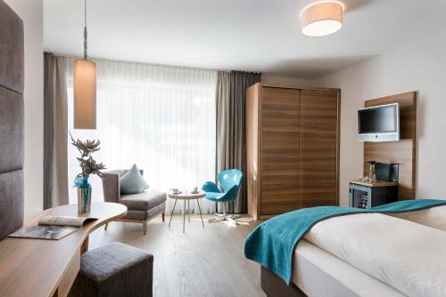 Imagen de la habitación del Hotel DolceVita Alpiana Resort. Foto 7