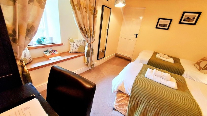 Imagen de la habitación del Hotel Dolgun Uchaf Guesthouse. Foto 9