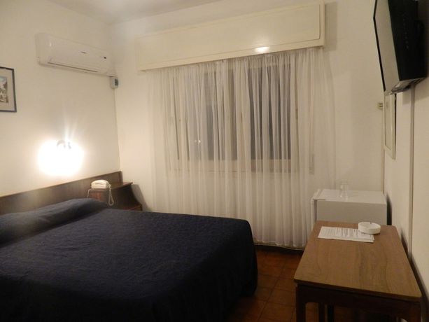 Imagen de la habitación del Hotel Dollar. Foto 13