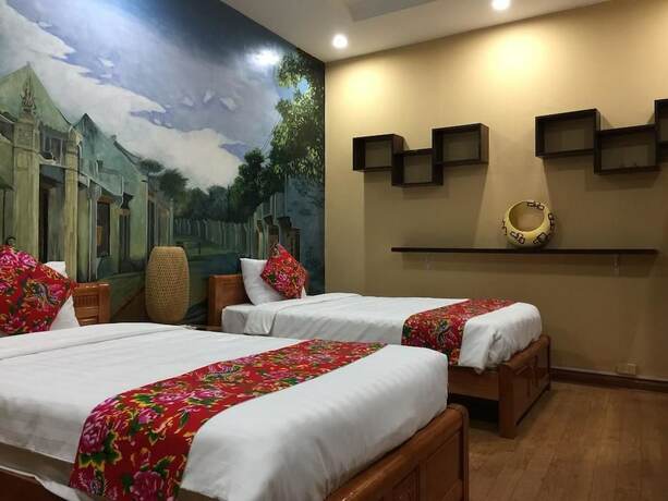 Imagen de la habitación del Hotel Dollar Homestay and Travel. Foto 32